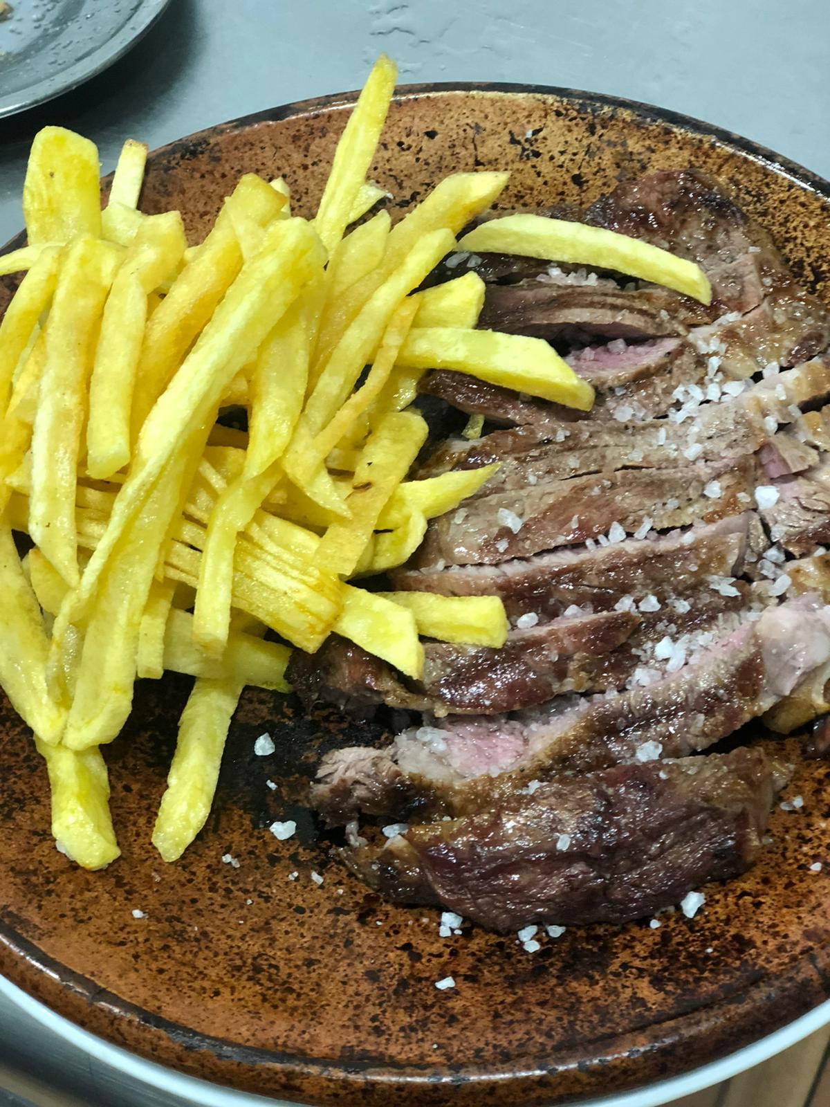 Imagen de una parrillada de carne